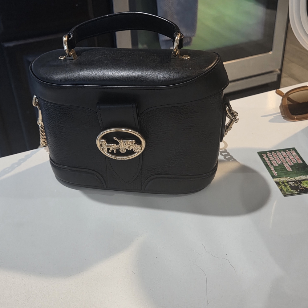 Coach Black Mini Bag with Gold Accents